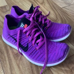 Bright purple Nike free flyknits size 7